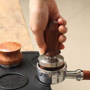 Non-slip pressed powder coffee pad for stable tamping