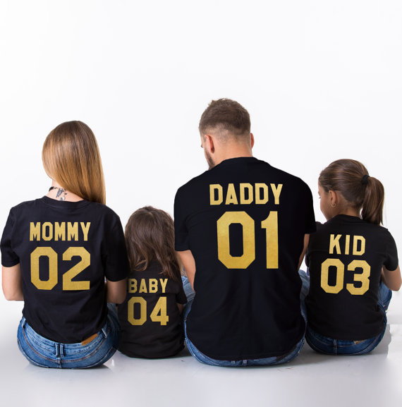 Kids and parents enjoying summer day in matching outfits