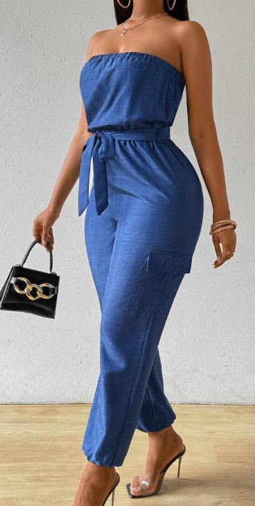 Back view of strapless denim-look jumpsuit with utility pockets
