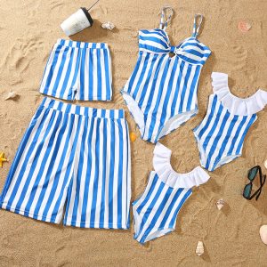 Parent-Child Blue and White Bikini Set on the Beach